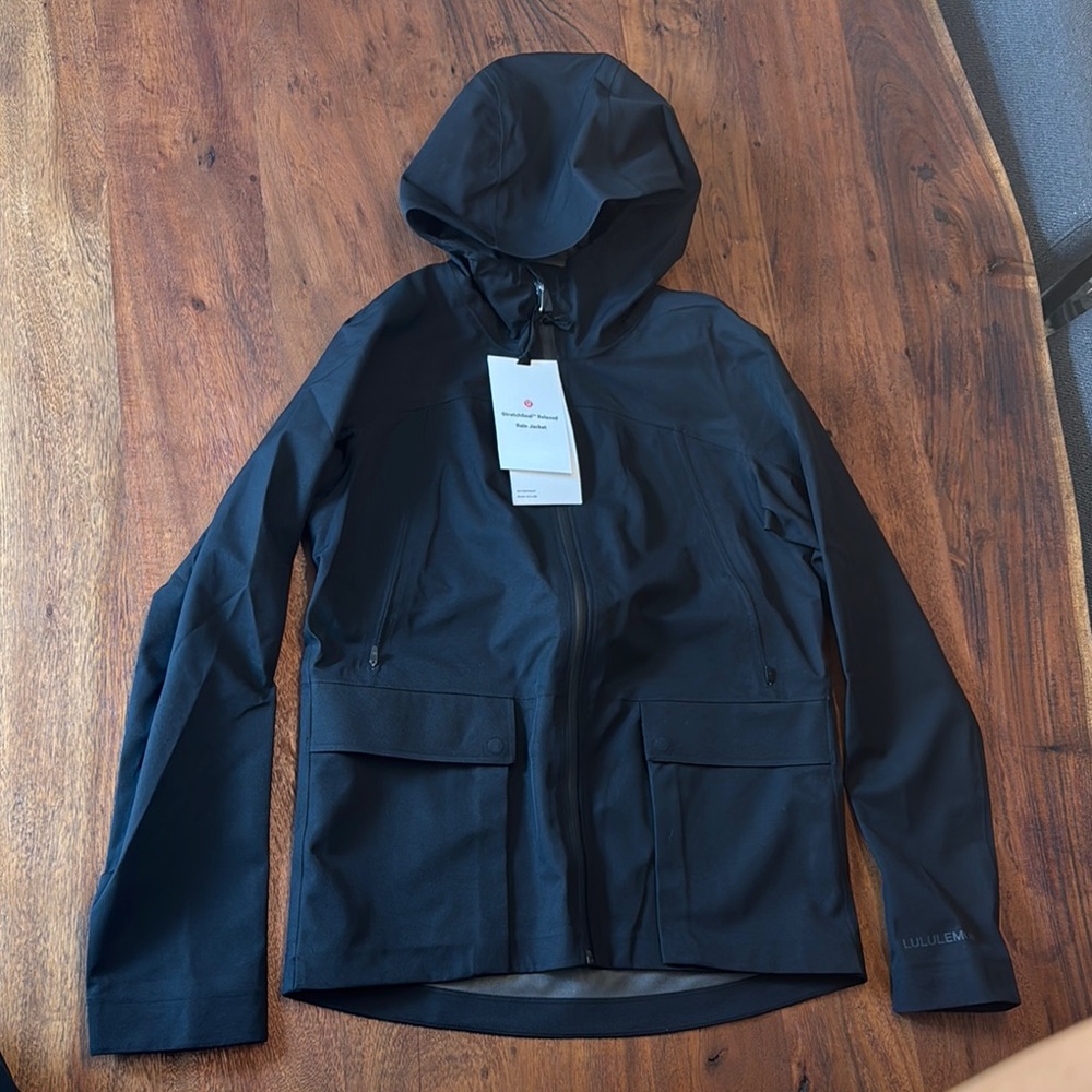 Lululemon Black Hooded Rain Jacket “StretchSeal Relaxed” fit, size 2